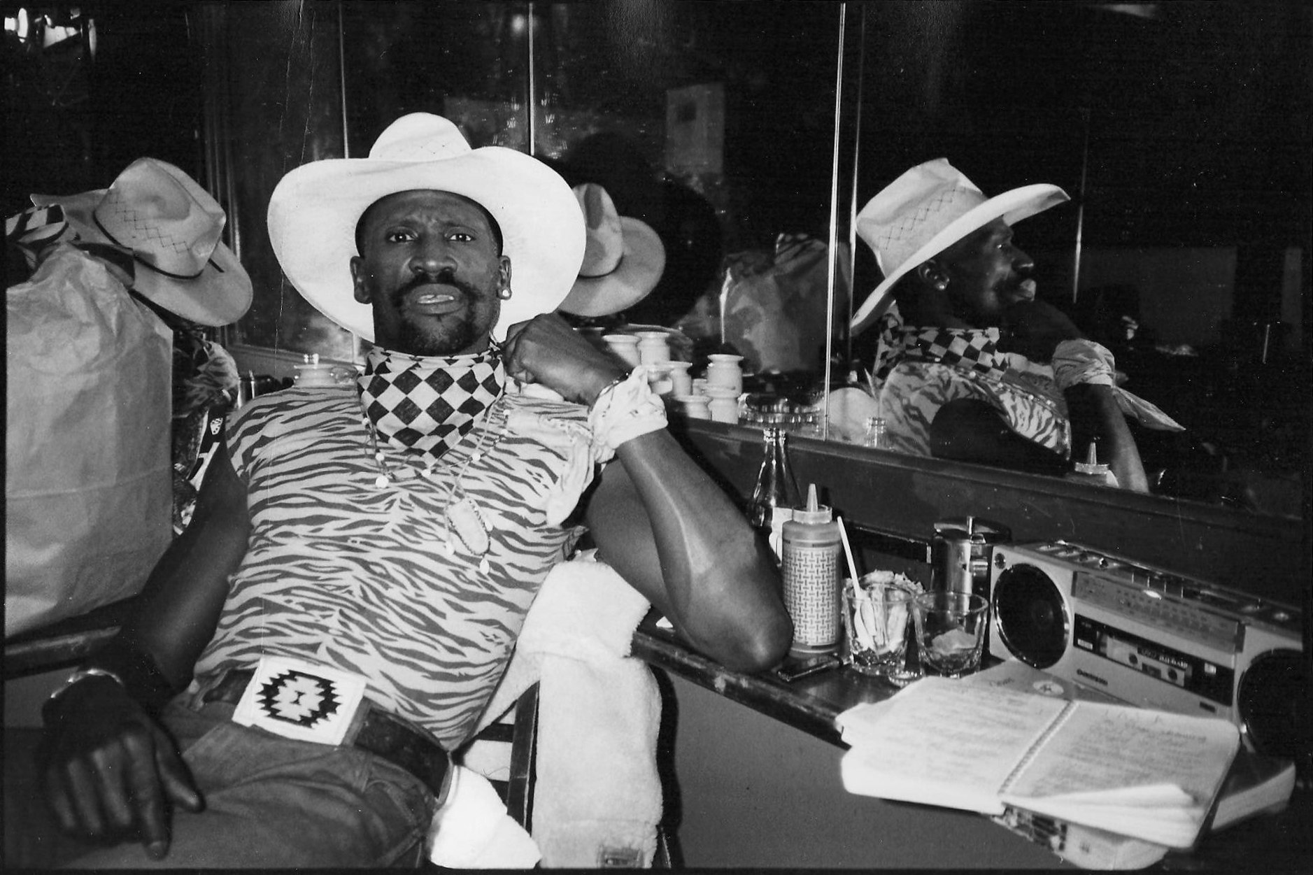 Taj Mahal backstage at the Bottom Line club, Greenwich Village, New York City, circa mid-1980s. Photo by John Kruth.
